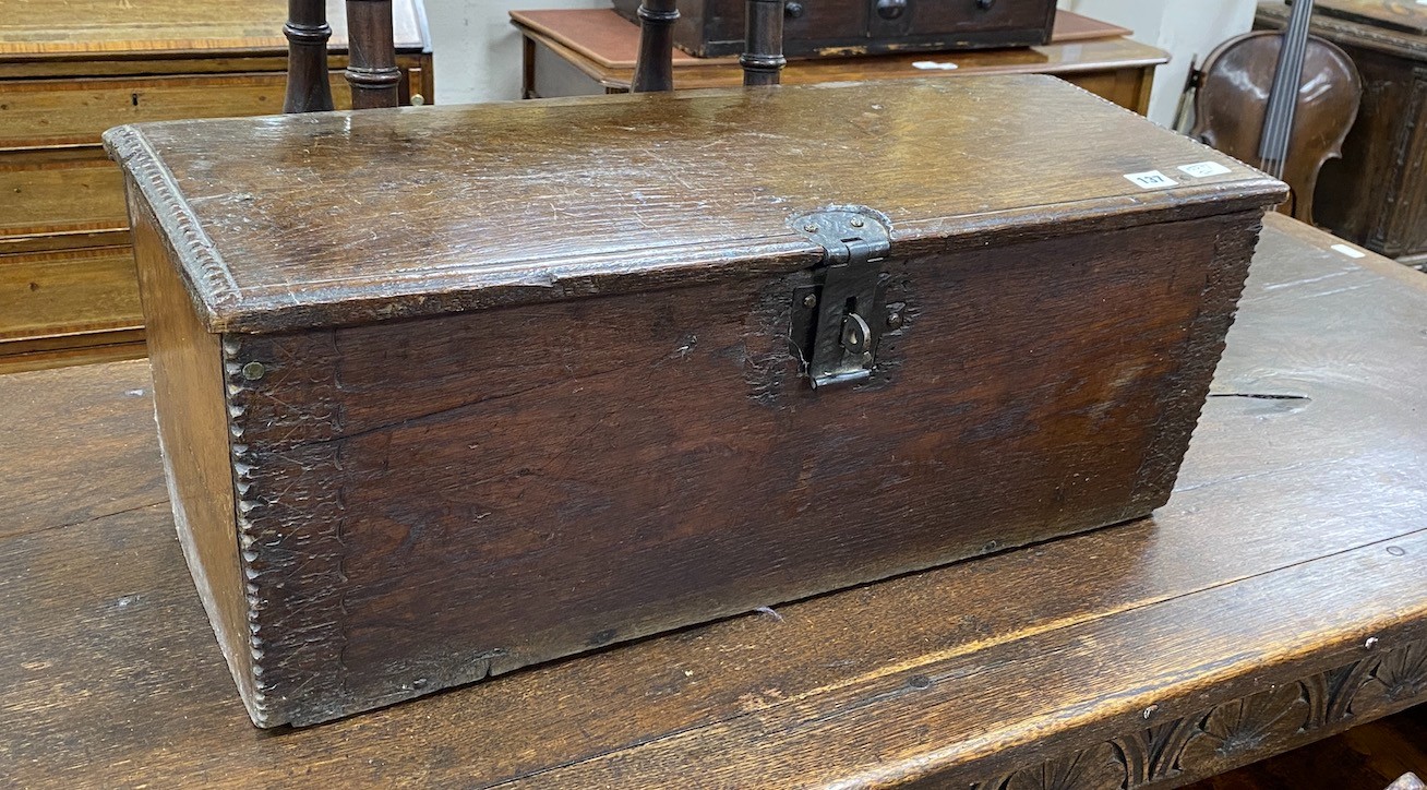 A small oak six plank coffer, length 74cm, depth 31cm, height 29cm